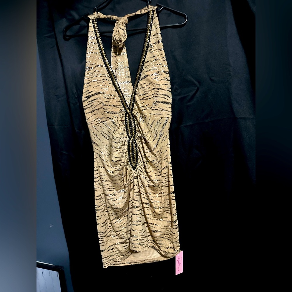 Never worn. Strapless. By Lydia USA